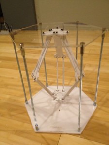 Assembled delta frame with arm hanging down.